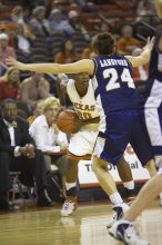 The lady longhorns defeated the Oral Roberts University's (ORU) Golden Eagles 79-40 Saturday night.

Filename: SRM_20061125_1328343.jpg
Aperture: f/2.8
Shutter Speed: 1/400
Body: Canon EOS-1D Mark II
Lens: Canon EF 80-200mm f/2.8 L