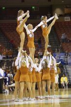 The lady longhorns defeated the Oral Roberts University's (ORU) Golden Eagles 79-40 Saturday night.

Filename: SRM_20061125_1330582.jpg
Aperture: f/2.8
Shutter Speed: 1/400
Body: Canon EOS-1D Mark II
Lens: Canon EF 80-200mm f/2.8 L
