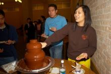 Gloria Sun and Samuel Liu. The Asian Business Students Association (ABSA) hosted a chocolate fondue Friday, January 26, 2007 before heading off to a movie premier.

Filename: SRM_20070126_1650226.jpg
Aperture: f/5.6
Shutter Speed: 1/160
Body: Canon EOS 20D
Lens: Canon EF-S 18-55mm f/3.5-5.6