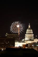 Austin Independence Day fireworks with the Capitol building, as viewed from atop the Manor Garage at The University of Texas at Austin.  The fireworks were launched from Auditorium Shores, downtown Austin, Friday, July 4, 2008.

Filename: SRM_20080704_2141445.jpg
Aperture: f/11.0
Shutter Speed: 6/1
Body: Canon EOS 20D
Lens: Canon EF 80-200mm f/2.8 L