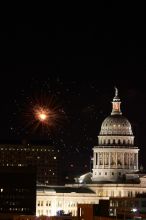 Austin Independence Day fireworks with the Capitol building, as viewed from atop the Manor Garage at The University of Texas at Austin.  The fireworks were launched from Auditorium Shores, downtown Austin, Friday, July 4, 2008.

Filename: SRM_20080704_2144323.jpg
Aperture: f/11.0
Shutter Speed: 2/1
Body: Canon EOS 20D
Lens: Canon EF 80-200mm f/2.8 L