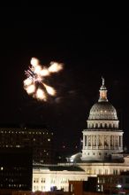 Austin Independence Day fireworks with the Capitol building, as viewed from atop the Manor Garage at The University of Texas at Austin.  The fireworks were launched from Auditorium Shores, downtown Austin, Friday, July 4, 2008.

Filename: SRM_20080704_2144404.jpg
Aperture: f/11.0
Shutter Speed: 2/1
Body: Canon EOS 20D
Lens: Canon EF 80-200mm f/2.8 L