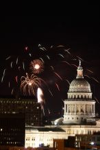 Austin Independence Day fireworks with the Capitol building, as viewed from atop the Manor Garage at The University of Texas at Austin.  The fireworks were launched from Auditorium Shores, downtown Austin, Friday, July 4, 2008.

Filename: SRM_20080704_2145127.jpg
Aperture: f/11.0
Shutter Speed: 5/1
Body: Canon EOS 20D
Lens: Canon EF 80-200mm f/2.8 L