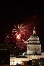 Austin Independence Day fireworks with the Capitol building, as viewed from atop the Manor Garage at The University of Texas at Austin.  The fireworks were launched from Auditorium Shores, downtown Austin, Friday, July 4, 2008.

Filename: SRM_20080704_2148463.jpg
Aperture: f/11.0
Shutter Speed: 2/1
Body: Canon EOS 20D
Lens: Canon EF 80-200mm f/2.8 L
