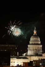 Austin Independence Day fireworks with the Capitol building, as viewed from atop the Manor Garage at The University of Texas at Austin.  The fireworks were launched from Auditorium Shores, downtown Austin, Friday, July 4, 2008.

Filename: SRM_20080704_2148524.jpg
Aperture: f/11.0
Shutter Speed: 2/1
Body: Canon EOS 20D
Lens: Canon EF 80-200mm f/2.8 L