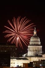 Austin Independence Day fireworks with the Capitol building, as viewed from atop the Manor Garage at The University of Texas at Austin.  The fireworks were launched from Auditorium Shores, downtown Austin, Friday, July 4, 2008.

Filename: SRM_20080704_2150444.jpg
Aperture: f/11.0
Shutter Speed: 5/1
Body: Canon EOS 20D
Lens: Canon EF 80-200mm f/2.8 L