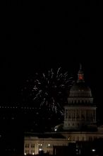 Austin Independence Day fireworks with the Capitol building, as viewed from atop the Manor Garage at The University of Texas at Austin.  The fireworks were launched from Auditorium Shores, downtown Austin, Friday, July 4, 2008.

Filename: SRM_20080704_2155301.jpg
Aperture: f/11.0
Shutter Speed: 1/1
Body: Canon EOS 20D
Lens: Canon EF 80-200mm f/2.8 L