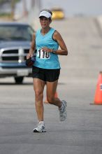 Karen Pearce placed second in her age groun at the Army Dillo half-marathon and 32K race.

Filename: SRM_20080921_1056424.jpg
Aperture: f/4.0
Shutter Speed: 1/2500
Body: Canon EOS-1D Mark II
Lens: Canon EF 300mm f/2.8 L IS