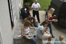 Coach Paul Hewitt grilled hamburgers at AXO Thursday night.  AXO was the winning sorority for the basketball attendance competition.

Filename: crw_0063_std.jpg
Aperture: f/7.1
Shutter Speed: 1/80
Body: Canon EOS DIGITAL REBEL
Lens: Sigma 15-30mm f/3.5-4.5 EX Aspherical DG DF