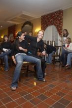 Christina Ramirez and Brittney Hibbs battle it out for first place in musical chairs at the Alpha Delta Pi Christmas party, Sunday, December 10, 2006.  Christina won.

Filename: SRM_20061210_1817422.jpg
Aperture: f/5.0
Shutter Speed: 1/100
Body: Canon EOS 20D
Lens: Canon EF-S 18-55mm f/3.5-5.6