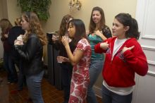 Sisters doing the chicken dance at the Alpha Delta Pi Christmas party, Sunday, December 10, 2006.

Filename: SRM_20061210_1818548.jpg
Aperture: f/5.0
Shutter Speed: 1/100
Body: Canon EOS 20D
Lens: Canon EF-S 18-55mm f/3.5-5.6