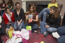 Reem Hafez, Megan Watson, Emily Skipper, Ashley Marz, and Caitlin Miller (from left) opening gifts at the Alpha Delta Pi Christmas party, Sunday, December 10, 2006.

Filename: SRM_20061210_1900547.jpg
Aperture: f/7.1
Shutter Speed: 1/100
Body: Canon EOS 20D
Lens: Canon EF-S 18-55mm f/3.5-5.6