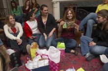 Beth Leeker, Reem Hafez, Megan Watson, Emily Skipper, Ashley Marz, and Caitlin Miller (from left) opening gifts at the Alpha Delta Pi Christmas party, Sunday, December 10, 2006.

Filename: SRM_20061210_1901008.jpg
Aperture: f/7.1
Shutter Speed: 1/100
Body: Canon EOS 20D
Lens: Canon EF-S 18-55mm f/3.5-5.6