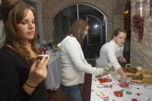 Jessica Hensarly and Lauren Fletcher make gingerbread men at the  Alpha Delta Pi Christmas party, Sunday, December 10, 2006.

Filename: SRM_20061210_1904202.jpg
Aperture: f/7.1
Shutter Speed: 1/100
Body: Canon EOS 20D
Lens: Canon EF-S 18-55mm f/3.5-5.6