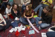 Reem Hafez, Megan Watson, Emily Skipper, and Ashley Marz (from left) opening gifts at the Alpha Delta Pi Christmas party, Sunday, December 10, 2006.

Filename: SRM_20061210_1910343.jpg
Aperture: f/7.1
Shutter Speed: 1/100
Body: Canon EOS 20D
Lens: Canon EF-S 18-55mm f/3.5-5.6