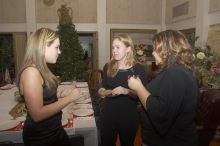 Jessica Iselt, Carol Gosset, and Katie Crane (from lefet) enjoy cocktails before the Alpha Xi Delta Christmas dinner, Friday, December 4, 2006.

Filename: SRM_20061204_1739561.jpg
Aperture: f/5.0
Shutter Speed: 1/250
Body: Canon EOS 20D
Lens: Canon EF-S 18-55mm f/3.5-5.6