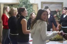 Sisters sing in prayer before dinner at the Alpha Xi Delta Christmas dinner, Friday, December 4, 2006.

Filename: SRM_20061204_1813120.jpg
Aperture: f/3.2
Shutter Speed: 1/25
Body: Canon EOS-1D Mark II
Lens: Canon EF 50mm f/1.8 II