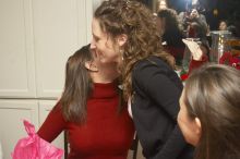 Mandy Mauldin, center, gives presents to Jessica Schreyer, left, and Allison Lear, right, at the Alpha Xi Delta Christmas dinner, Friday, December 4, 2006.

Filename: SRM_20061204_1815427.jpg
Aperture: f/6.3
Shutter Speed: 1/250
Body: Canon EOS 20D
Lens: Canon EF-S 18-55mm f/3.5-5.6