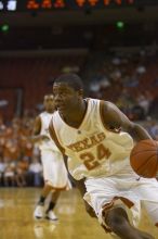 The longhorns defeated the Texas Southern University (TSU) Tigers 90-50 Tuesday night.

Filename: SRM_20061128_1926522.jpg
Aperture: f/2.8
Shutter Speed: 1/640
Body: Canon EOS-1D Mark II
Lens: Canon EF 80-200mm f/2.8 L