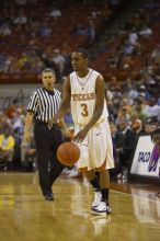 Guard A.J. Abrams, #3.  The longhorns defeated the Texas Southern University (TSU) Tigers 90-50 Tuesday night.

Filename: SRM_20061128_1928240.jpg
Aperture: f/2.8
Shutter Speed: 1/640
Body: Canon EOS-1D Mark II
Lens: Canon EF 80-200mm f/2.8 L