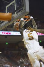 Forward Damion James, #5.  The longhorns defeated the Texas Southern University (TSU) Tigers 90-50 Tuesday night.

Filename: SRM_20061128_2008362.jpg
Aperture: f/2.8
Shutter Speed: 1/640
Body: Canon EOS-1D Mark II
Lens: Canon EF 80-200mm f/2.8 L