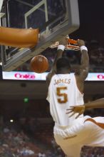 Forward Damion James, #5.  The longhorns defeated the Texas Southern University (TSU) Tigers 90-50 Tuesday night.

Filename: SRM_20061128_2008383.jpg
Aperture: f/2.8
Shutter Speed: 1/640
Body: Canon EOS-1D Mark II
Lens: Canon EF 80-200mm f/2.8 L