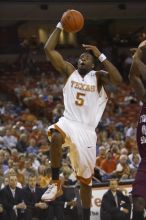 Forward Damion James, #5.  The longhorns defeated the Texas Southern University (TSU) Tigers 90-50 Tuesday night.

Filename: SRM_20061128_2009145.jpg
Aperture: f/2.8
Shutter Speed: 1/640
Body: Canon EOS-1D Mark II
Lens: Canon EF 80-200mm f/2.8 L