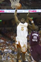 Forward Damion James, #5.  The longhorns defeated the Texas Southern University (TSU) Tigers 90-50 Tuesday night.

Filename: SRM_20061128_2009166.jpg
Aperture: f/2.8
Shutter Speed: 1/640
Body: Canon EOS-1D Mark II
Lens: Canon EF 80-200mm f/2.8 L