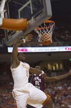 Forward Damion James, #5.  The longhorns defeated the Texas Southern University (TSU) Tigers 90-50 Tuesday night.

Filename: SRM_20061128_2009208.jpg
Aperture: f/2.8
Shutter Speed: 1/640
Body: Canon EOS-1D Mark II
Lens: Canon EF 80-200mm f/2.8 L