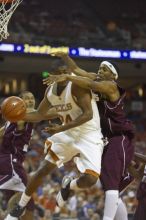 Guard Justin Mason, #24.  The longhorns defeated the Texas Southern University (TSU) Tigers 90-50 Saturday night.

Filename: SRM_20061128_2013220.jpg
Aperture: f/2.8
Shutter Speed: 1/640
Body: Canon EOS-1D Mark II
Lens: Canon EF 80-200mm f/2.8 L