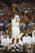 Guard Justin Mason, #24.  The longhorns defeated the Texas Southern University (TSU) Tigers 90-50 Saturday night.

Filename: SRM_20061128_2013429.jpg
Aperture: f/2.8
Shutter Speed: 1/640
Body: Canon EOS-1D Mark II
Lens: Canon EF 80-200mm f/2.8 L