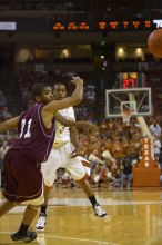 Guard A.J. Abrams, #3.  The longhorns defeated the Texas Southern University (TSU) Tigers 90-50 Tuesday night.

Filename: SRM_20061128_2020502.jpg
Aperture: f/2.8
Shutter Speed: 1/640
Body: Canon EOS-1D Mark II
Lens: Canon EF 80-200mm f/2.8 L