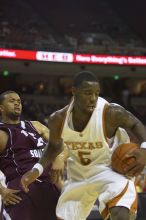 Forward Damion James, #5.  The longhorns defeated the Texas Southern University (TSU) Tigers 90-50 Tuesday night.

Filename: SRM_20061128_2022343.jpg
Aperture: f/2.8
Shutter Speed: 1/640
Body: Canon EOS-1D Mark II
Lens: Canon EF 80-200mm f/2.8 L