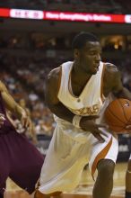 Forward Damion James, #5.  The longhorns defeated the Texas Southern University (TSU) Tigers 90-50 Tuesday night.

Filename: SRM_20061128_2022364.jpg
Aperture: f/2.8
Shutter Speed: 1/640
Body: Canon EOS-1D Mark II
Lens: Canon EF 80-200mm f/2.8 L