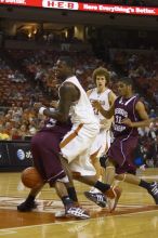 Forward Damion James, #5.  The longhorns defeated the Texas Southern University (TSU) Tigers 90-50 Tuesday night.

Filename: SRM_20061128_2023026.jpg
Aperture: f/2.8
Shutter Speed: 1/640
Body: Canon EOS-1D Mark II
Lens: Canon EF 80-200mm f/2.8 L