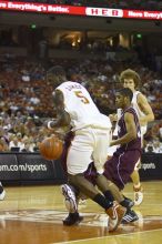 Forward Damion James, #5.  The longhorns defeated the Texas Southern University (TSU) Tigers 90-50 Tuesday night.

Filename: SRM_20061128_2023047.jpg
Aperture: f/2.8
Shutter Speed: 1/640
Body: Canon EOS-1D Mark II
Lens: Canon EF 80-200mm f/2.8 L