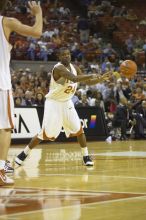 Guard Justin Mason, #24.  The longhorns defeated the Texas Southern University (TSU) Tigers 90-50 Saturday night.

Filename: SRM_20061128_2027026.jpg
Aperture: f/2.8
Shutter Speed: 1/640
Body: Canon EOS-1D Mark II
Lens: Canon EF 80-200mm f/2.8 L