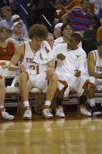 Matt Hill, #21.  The longhorns defeated the Texas Southern University (TSU) Tigers 90-50 Tuesday night.

Filename: SRM_20061128_2027541.jpg
Aperture: f/2.8
Shutter Speed: 1/640
Body: Canon EOS-1D Mark II
Lens: Canon EF 80-200mm f/2.8 L