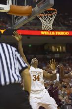 Center Dexter Pittman, #34.  The longhorns defeated the Texas Southern University (TSU) Tigers 90-50 Tuesday night.

Filename: SRM_20061128_2029545.jpg
Aperture: f/2.8
Shutter Speed: 1/640
Body: Canon EOS-1D Mark II
Lens: Canon EF 80-200mm f/2.8 L