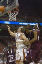 The longhorns defeated the Texas Southern University (TSU) Tigers 90-50 Tuesday night.

Filename: SRM_20061128_2046080.jpg
Aperture: f/2.8
Shutter Speed: 1/640
Body: Canon EOS-1D Mark II
Lens: Canon EF 80-200mm f/2.8 L