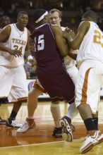 The longhorns defeated the Texas Southern University (TSU) Tigers 90-50 Tuesday night.

Filename: SRM_20061128_2046164.jpg
Aperture: f/2.8
Shutter Speed: 1/640
Body: Canon EOS-1D Mark II
Lens: Canon EF 80-200mm f/2.8 L
