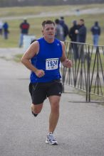 James Rogers, 1:31:05, running the Decker Challenge 20K 2006 road race.

Filename: SRM_20061203_0934481.jpg
Aperture: f/4.0
Shutter Speed: 1/500
Body: Canon EOS-1D Mark II
Lens: Canon EF 80-200mm f/2.8 L