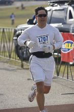 Patrick Y Wong, 1:39:42, finishing the Decker Challenge 20K 2006 road race.

Filename: SRM_20061203_0943588.jpg
Aperture: f/4.0
Shutter Speed: 1/1250
Body: Canon EOS-1D Mark II
Lens: Canon EF 80-200mm f/2.8 L