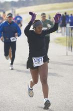 Venus Dever, 1:40:07, dancing across the finish at Decker Challenge 20K 2006 road race.

Filename: SRM_20061203_0944064.jpg
Aperture: f/4.0
Shutter Speed: 1/640
Body: Canon EOS-1D Mark II
Lens: Canon EF 80-200mm f/2.8 L