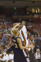 Earnesia Williams, #00.  The lady longhorns defeated the Oral Roberts University's (ORU) Golden Eagles 79-40 Saturday night.

Filename: SRM_20061125_1309243.jpg
Aperture: f/2.8
Shutter Speed: 1/400
Body: Canon EOS-1D Mark II
Lens: Canon EF 80-200mm f/2.8 L