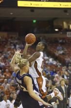 Earnesia Williams, #00.  The lady longhorns defeated the Oral Roberts University's (ORU) Golden Eagles 79-40 Saturday night.

Filename: SRM_20061125_1309264.jpg
Aperture: f/2.8
Shutter Speed: 1/400
Body: Canon EOS-1D Mark II
Lens: Canon EF 80-200mm f/2.8 L