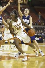 Forward Tiffany Jackson, #33.  The lady longhorns defeated the Oral Roberts University's (ORU) Golden Eagles 79-40 Saturday night.

Filename: SRM_20061125_1311148.jpg
Aperture: f/2.8
Shutter Speed: 1/400
Body: Canon EOS-1D Mark II
Lens: Canon EF 80-200mm f/2.8 L