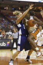 Forward Tiffany Jackson, #33.  The lady longhorns defeated the Oral Roberts University's (ORU) Golden Eagles 79-40 Saturday night.

Filename: SRM_20061125_1311200.jpg
Aperture: f/2.8
Shutter Speed: 1/400
Body: Canon EOS-1D Mark II
Lens: Canon EF 80-200mm f/2.8 L