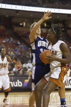 Forward Tiffany Jackson, #33.  The lady longhorns defeated the Oral Roberts University's (ORU) Golden Eagles 79-40 Saturday night.

Filename: SRM_20061125_1311221.jpg
Aperture: f/2.8
Shutter Speed: 1/400
Body: Canon EOS-1D Mark II
Lens: Canon EF 80-200mm f/2.8 L