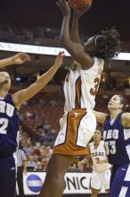 Forward Tiffany Jackson, #33.  The lady longhorns defeated the Oral Roberts University's (ORU) Golden Eagles 79-40 Saturday night.

Filename: SRM_20061125_1311263.jpg
Aperture: f/2.8
Shutter Speed: 1/400
Body: Canon EOS-1D Mark II
Lens: Canon EF 80-200mm f/2.8 L